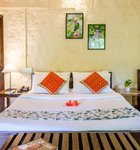 Postel nebo postele na pokoji v ubytování Nature's Nest Eco Resort Goa, Near Dudhsagar Waterfalls