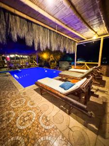 Swimmingpoolen hos eller tæt på Villa Naylamp loft 10 beach pocitas