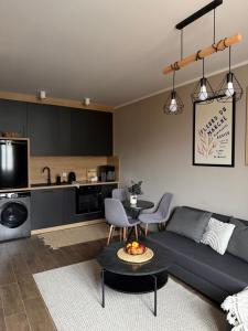 Køkken eller tekøkken på Apartament MOCHA Szczytno Mazury