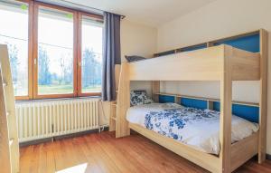 Giường trong phòng chung tại LE BIEn Zen