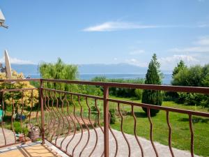 a balcony with a view of the ocean at Galija in Struga