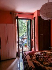 A bed or beds in a room at La Sorgente B&B