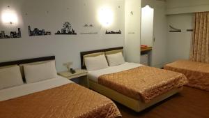 Letto o letti in una camera di Rido Hotel