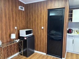 Kuchyň nebo kuchyňský kout v ubytování בקתה מעץ בחווה farm B''H + 10 fotografií