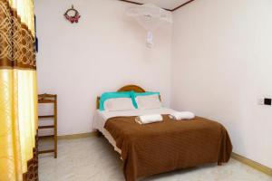 Ένα ή περισσότερα κρεβάτια σε δωμάτιο στο Gal Oya Lake View Inginiyagala