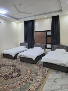 Giường trong phòng chung tại Sand Paradise +20 ảnh