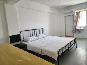 En eller flere senge i et værelse på Toucan Garden