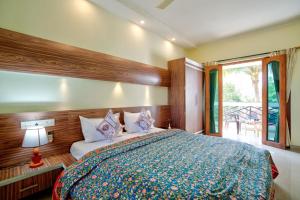 Postel nebo postele na pokoji v ubytování Eufregina Resort & Spa - South Goa