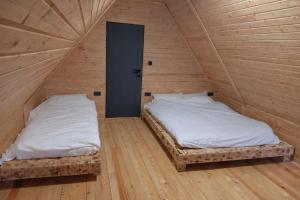 En eller flere senge i et værelse på Brvnara Tarin osmeh