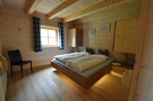 Postel nebo postele na pokoji v ubytování Sonnenplatzl im Zillertal