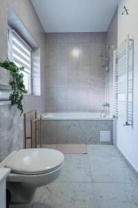 Et badeværelse på City Gardens Villa