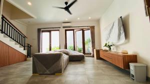 Postel nebo postele na pokoji v ubytování 2-bedroom minimalist villa in Sanur