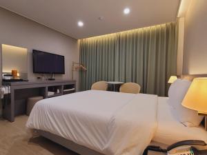 Μια τηλεόραση ή/και κέντρο ψυχαγωγίας στο 호텔휴