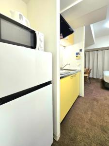 Køkken eller tekøkken på 嵐 Arashi BNB 大国町 No8113