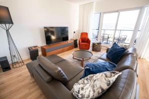 Posezení v ubytování 301 - Luxury Condo - Exceptional View & Pool