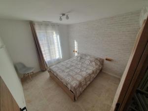 Postel nebo postele na pokoji v ubytování La Parenthèse + 4 fotografie