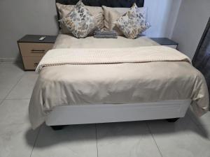 Postel nebo postele na pokoji v ubytování Bill's villa