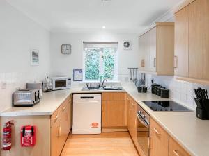 Køkken eller tekøkken på Rosemary Cottage