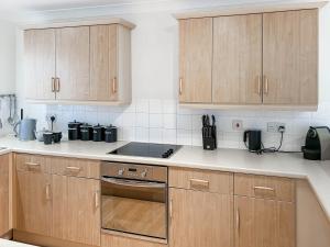 Køkken eller tekøkken på Rosemary Cottage