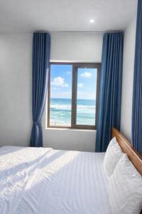 Postel nebo postele na pokoji v ubytování Tiến Hưng Tam Thanh Villa