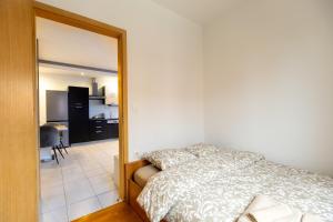 Giường trong phòng chung tại Apartment Supernova