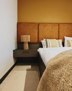 Ένα ή περισσότερα κρεβάτια σε δωμάτιο στο Leśniczanka +6 φωτογραφίες