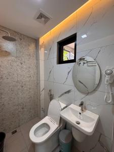 Koupelna v ubytování Kugi Hostel - Self Check-in Capsule Hostel near Cebu Airport