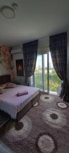 Giường trong phòng chung tại Studio LUX