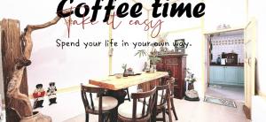 Příslušenství pro přípravu čaje a kávy v ubytování 沐時光民宿 + 18 fotografií