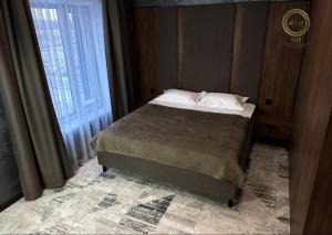 En eller flere senge i et værelse på Quan Qonaq Uii