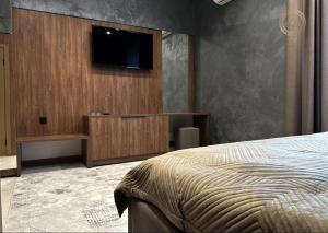 Et tv og/eller underholdning på Quan Qonaq Uii