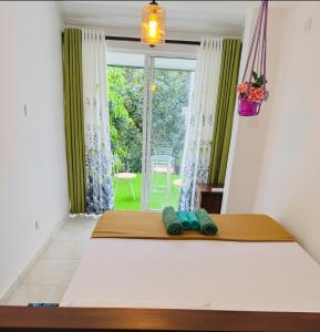 Ένα ή περισσότερα κρεβάτια σε δωμάτιο στο 35-B-5 Kandy +17 φωτογραφίες