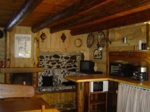 A kitchen or kitchenette at Notre Bergerie