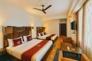 Postel nebo postele na pokoji v ubytování Hotel The great #ambience #balcony view #mountainview #parking + 11 fotografií