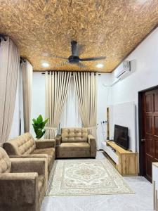 Posezení v ubytování Damai Homestay