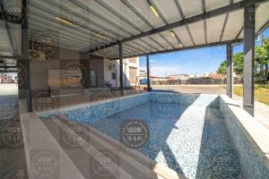 Swimmingpoolen hos eller tæt på 慕漾民宿 包棟獨棟游泳池近羅運