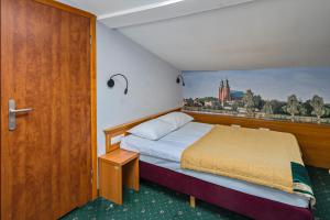 En eller flere senge i et værelse på Pietrak Hotel + 62 billeder