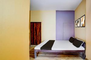 Giường trong phòng chung tại Hotel O Euphoria inn +22 ảnh