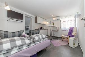 TV a/nebo společenská místnost v ubytování Apartment Luce Mala