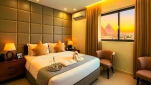 En eller flere senge i et værelse på PYramiDs MaGiC EyE HoTeL