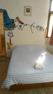 Postel nebo postele na pokoji v ubytování 太魯閣蘇西小空間 SusiSpace