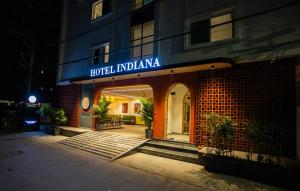 a building with a sign that reads hotel indiana at Hotel Indiana Hitech City in Hyderabad