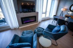 Et opholdsområde på 308 - Condo Le Victorien - Comfort Luxury & Pool