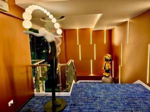 Ένα ή περισσότερα κρεβάτια σε δωμάτιο στο Palette Hi Hotel Bangkok