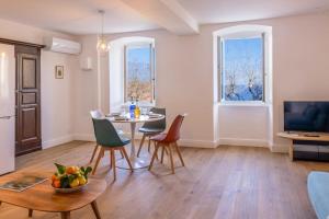 Et opholdsområde på Casa Carmi appartement vue mer à Erbalunga