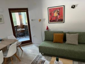 Posezení v ubytování Triglav NP Apartment - above Bled + 40 fotografií