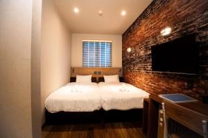 En eller flere senge i et værelse på KAJAhause