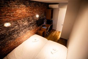 En eller flere senge i et værelse på KAJAhause + 33 billeder