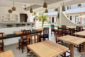 En restaurant eller et andet spisested på Shirley Residence Kiwengwa