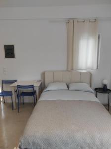 Postel nebo postele na pokoji v ubytování Aurora Galini - Aqua Serenity Stay